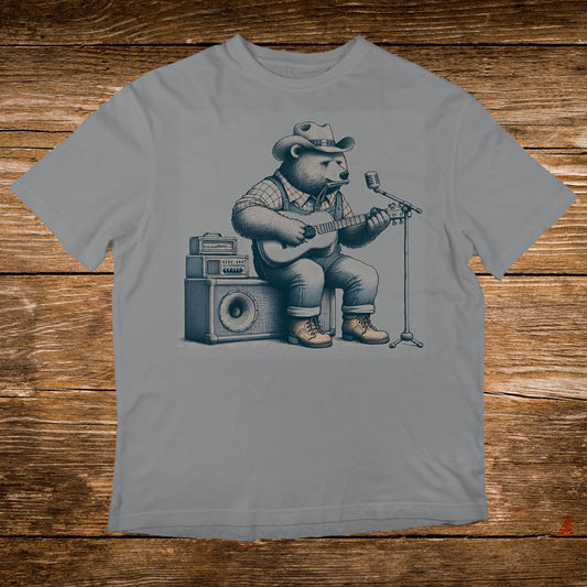 Bear wearing a cowboy hat plays guitar and sings into a microphone.