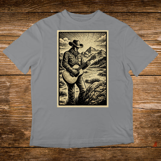 Cowboy playing guitar in a scenic landscape with mountains and a lake.