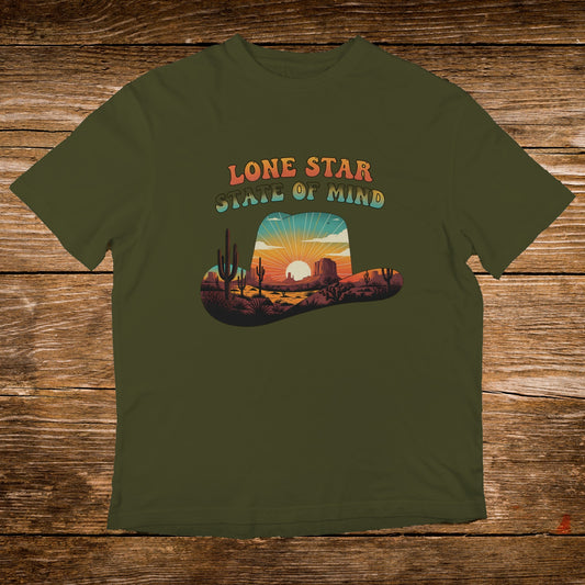 Olive t-shirt with a desert landscape inside a cowboy hat, featuring "Lone Star State of Mind" text.
