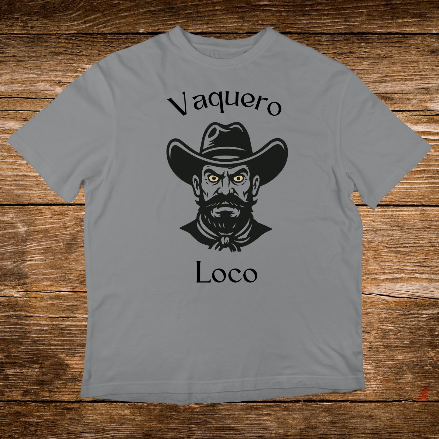 Grey t-shirt with "Vaquero Loco" and a stylized cowboy portrait.