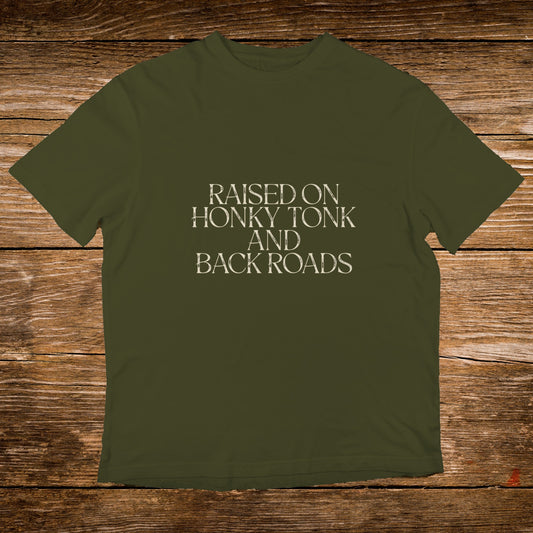 Olive green t-shirt with "RAISED ON HONKY TONK AND BACK ROADS" text.