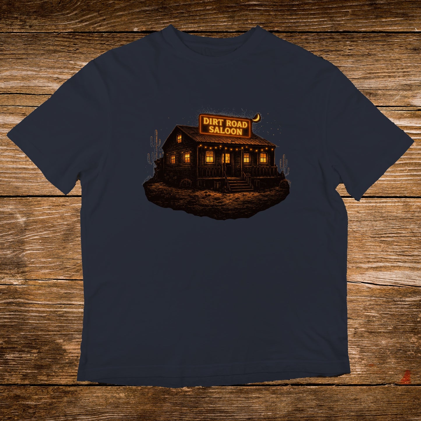 Dark t-shirt with a vintage illustration of a saloon at night.