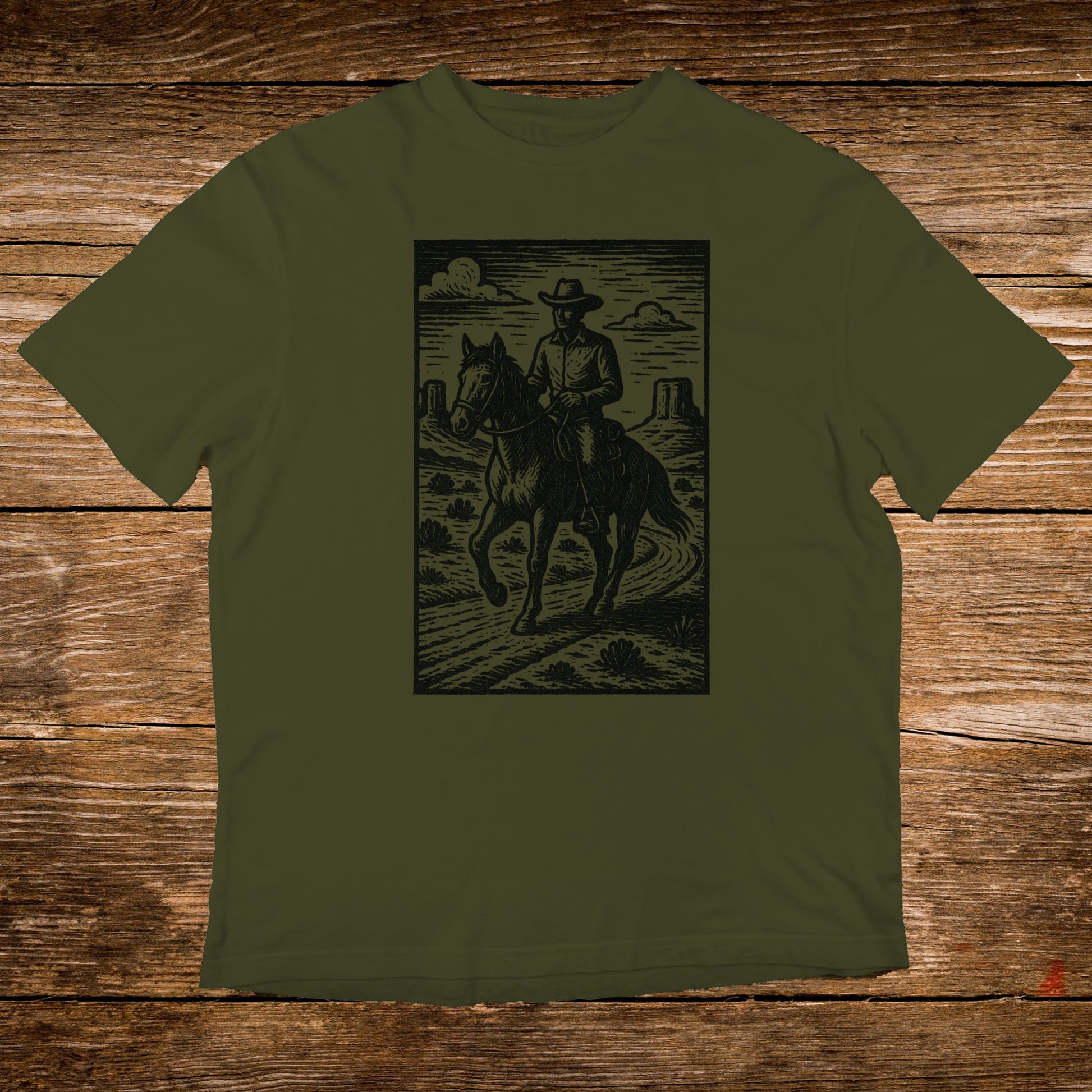 Cowboy on horseback rides through a desert landscape with mountains.