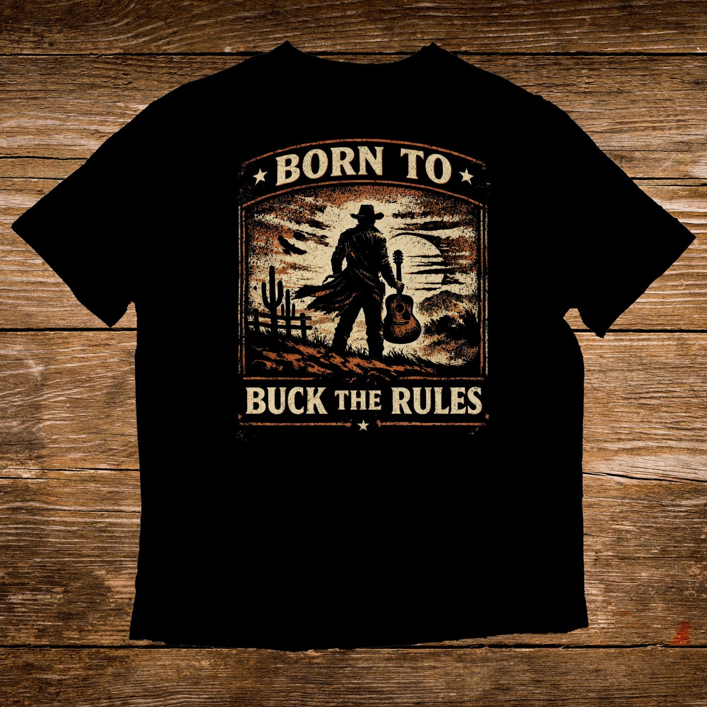 Black t-shirt with cowboy silhouette and "Born to Buck the Rules" text.