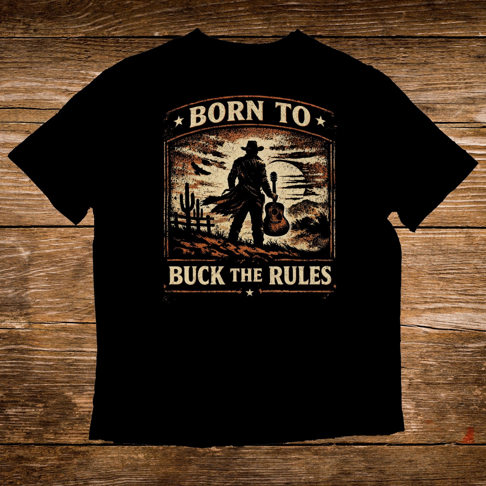 Black t-shirt with cowboy silhouette and "Born to Buck the Rules" text.
