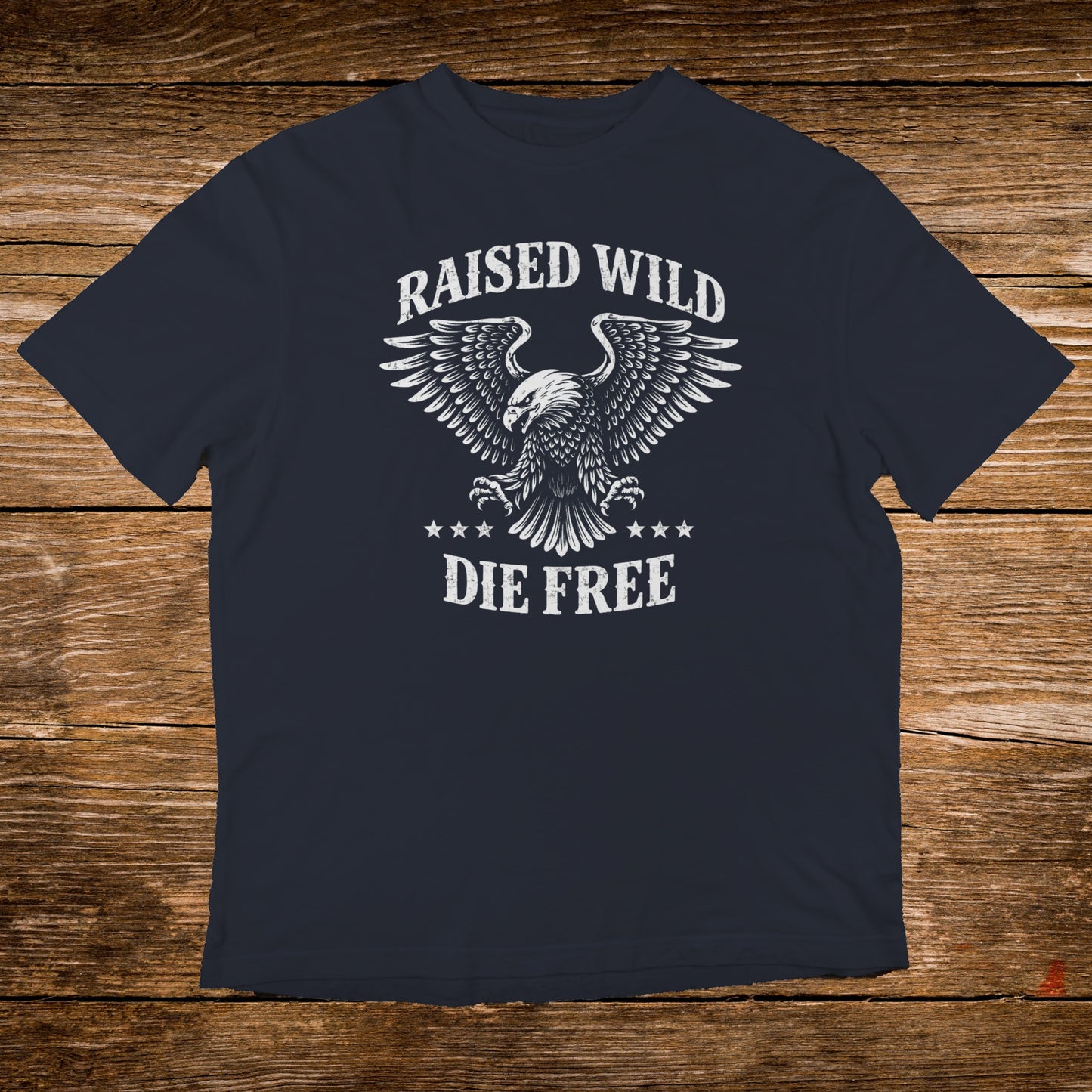 Navy t-shirt with eagle graphic and text "RAISED WILD DIE FREE".