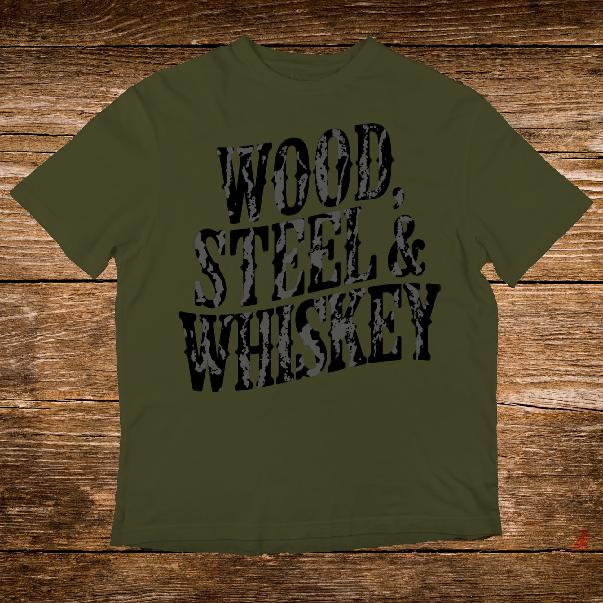 Olive green t-shirt with black and grey "WOOD. STEEL & WHISKEY" text.