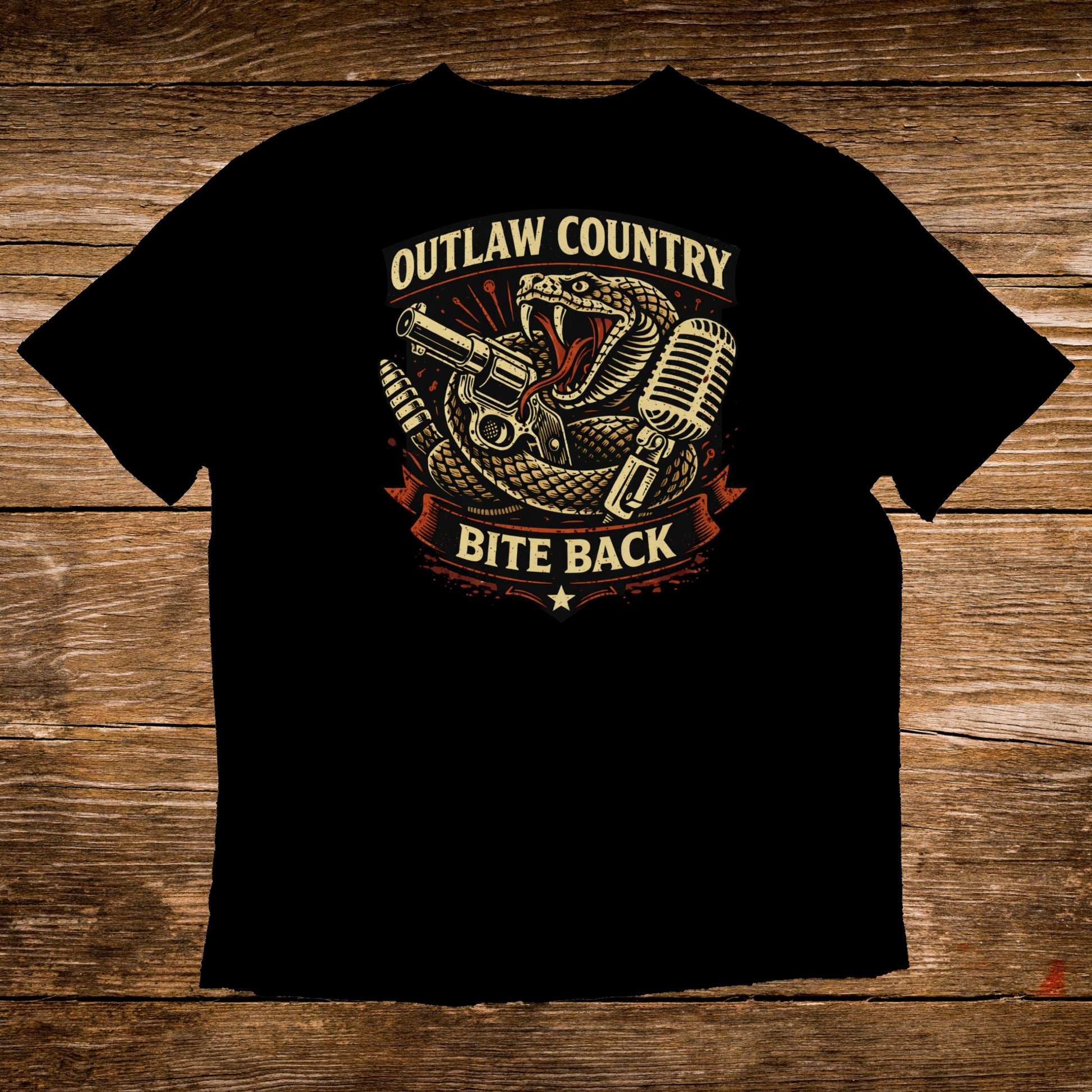 Black t-shirt with "Outlaw Country Bite Back" text and snake coiled around microphone and gun.