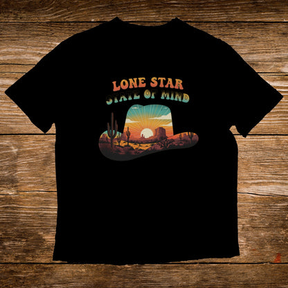 Cowboy hat with "Lone Star State of Mind" and desert sunset scene.