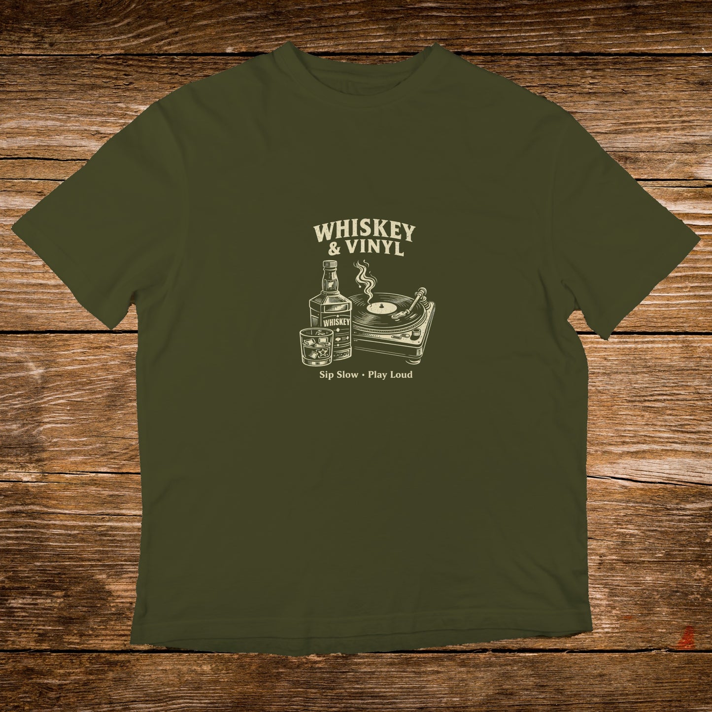 Green t-shirt with "Whiskey & Vinyl" graphic featuring a record player and whiskey bottle.