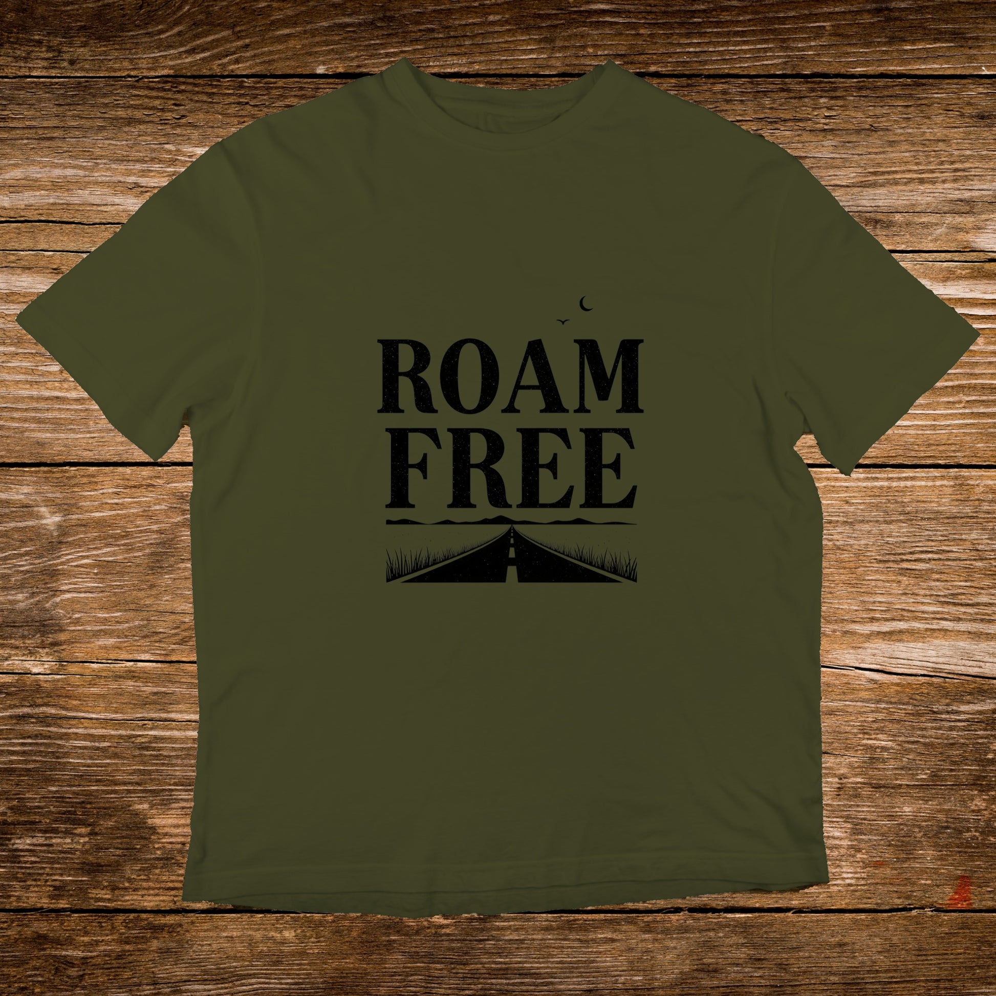 Olive green t-shirt with "ROAM FREE" text and a road graphic.
