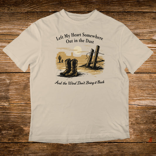Cream t-shirt with cowboy boots, desert scene, and Western phrase.
