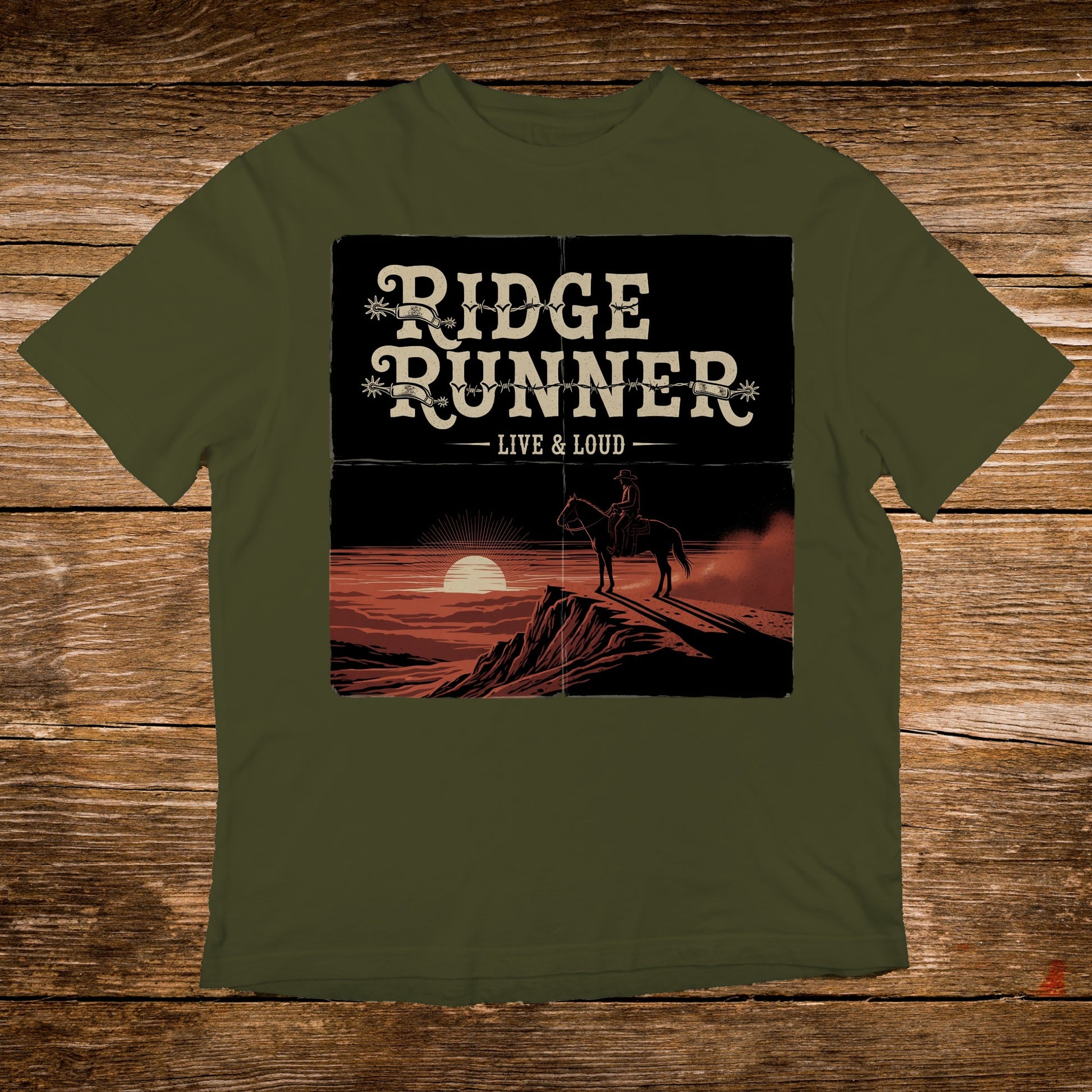 Olive t-shirt featuring a cowboy on horseback silhouetted against a sunset.