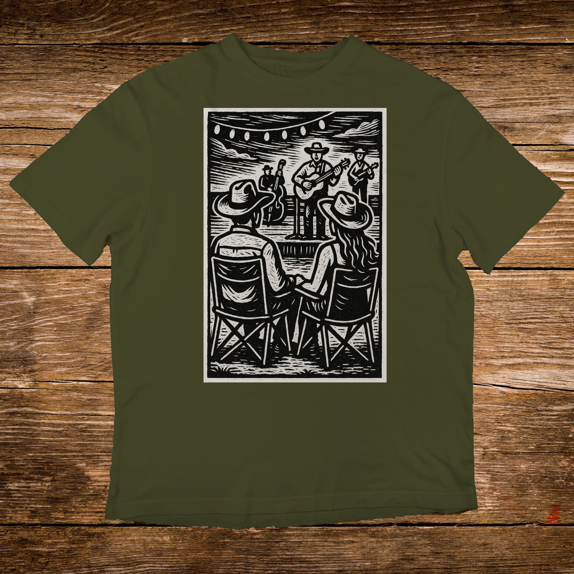 T-shirt with woodcut illustration of a live band performing outdoors for seated audience.