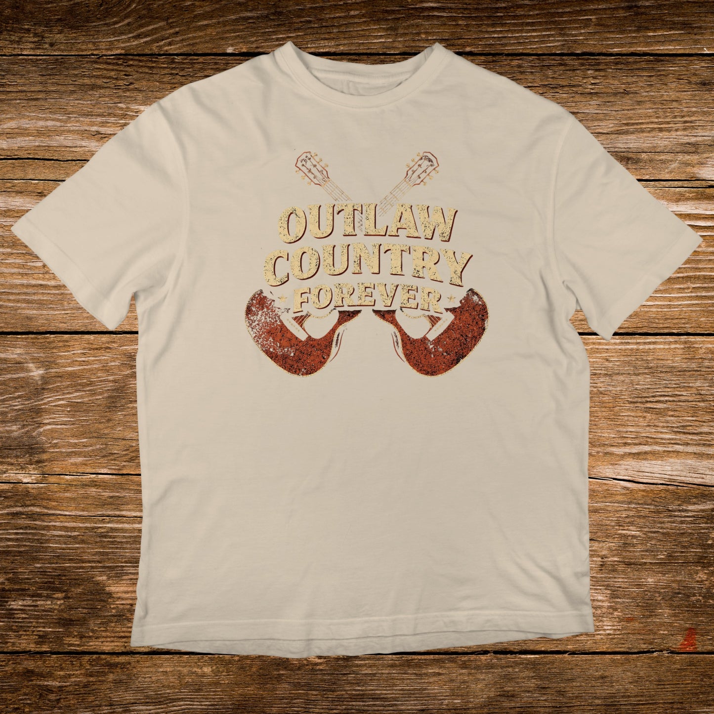 Cream t-shirt with "Outlaw Country Forever" text and two guitars.
