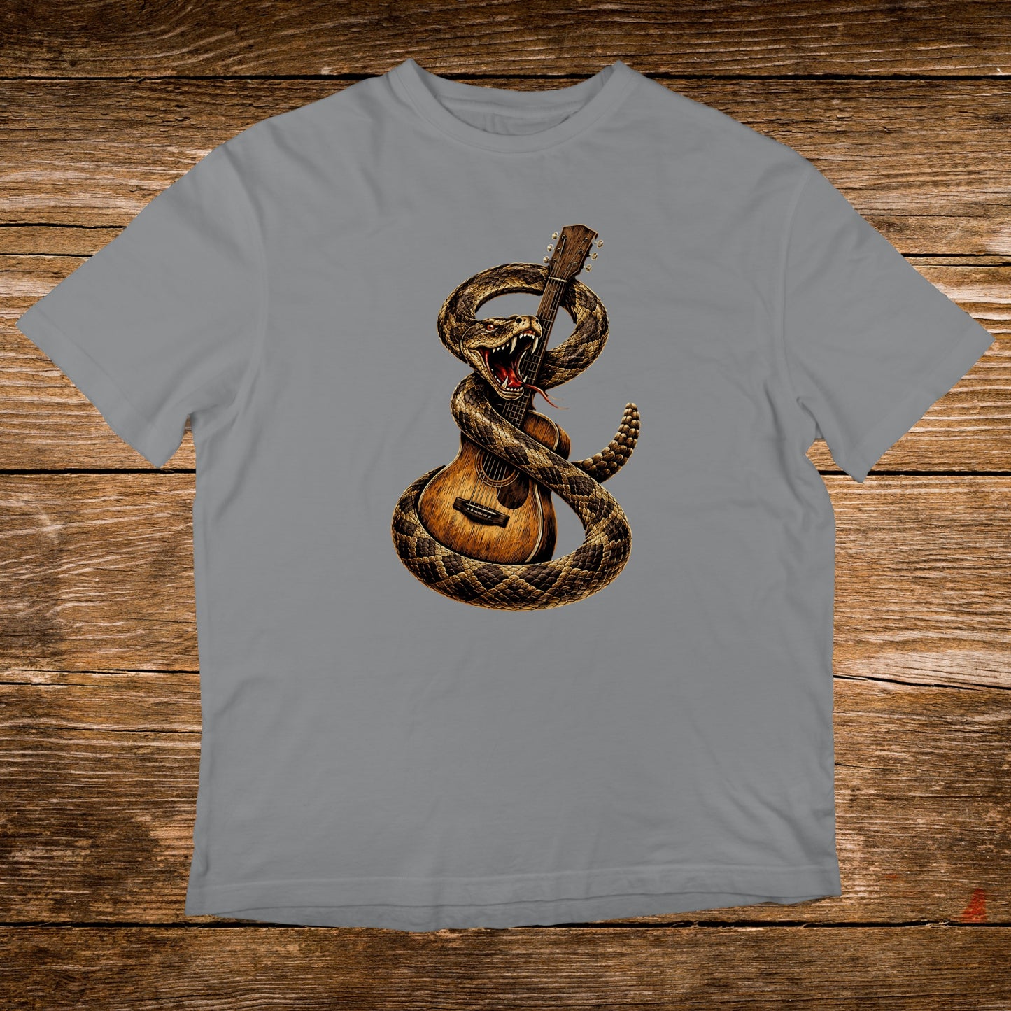 Rattlesnake coiled around acoustic guitar illustration on grey t-shirt.