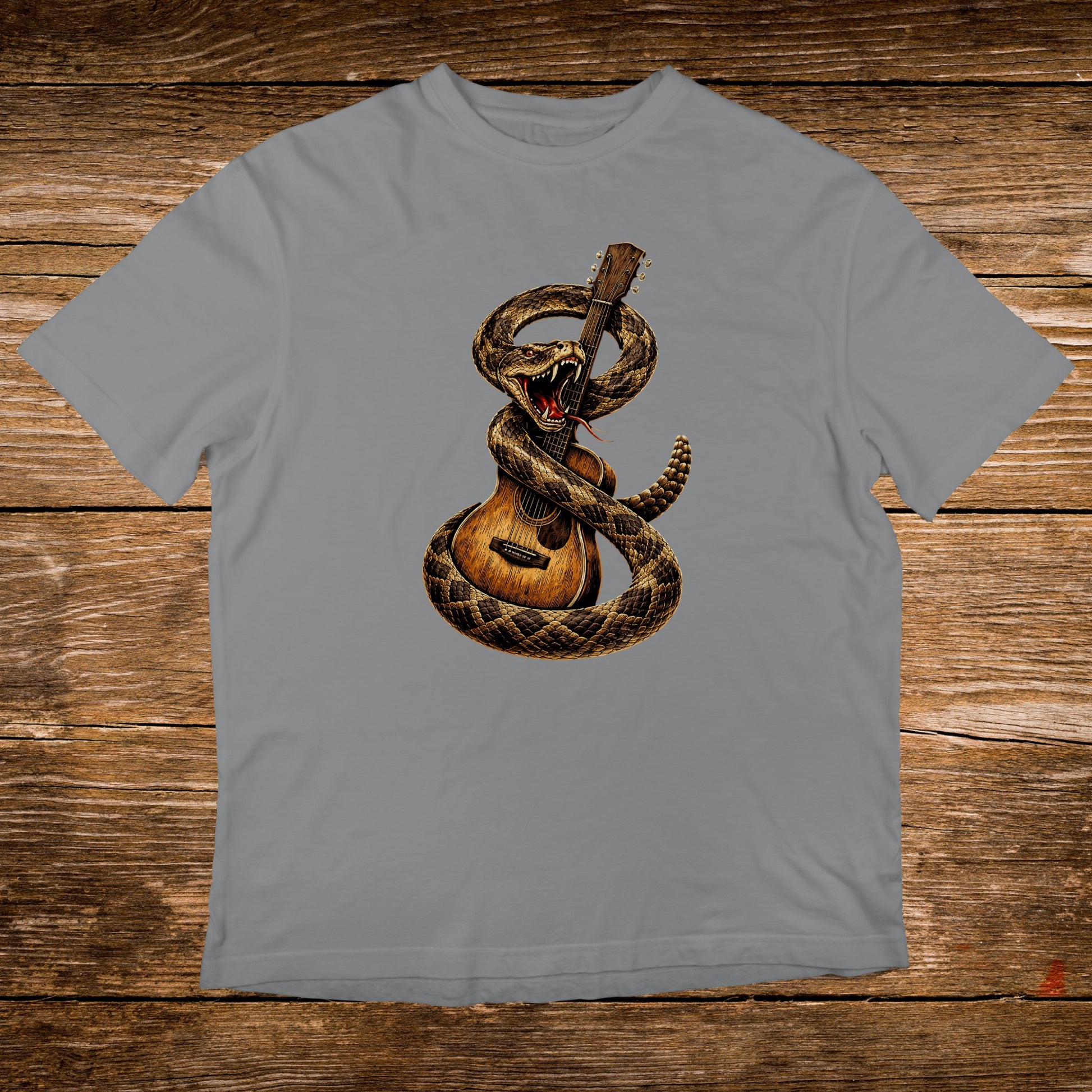 Rattlesnake coiled around acoustic guitar illustration on grey t-shirt.