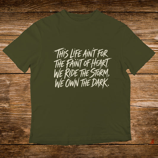 Olive green t-shirt with white text: "This life ain't for the faint of heart. We ride the storm, we own the dark."