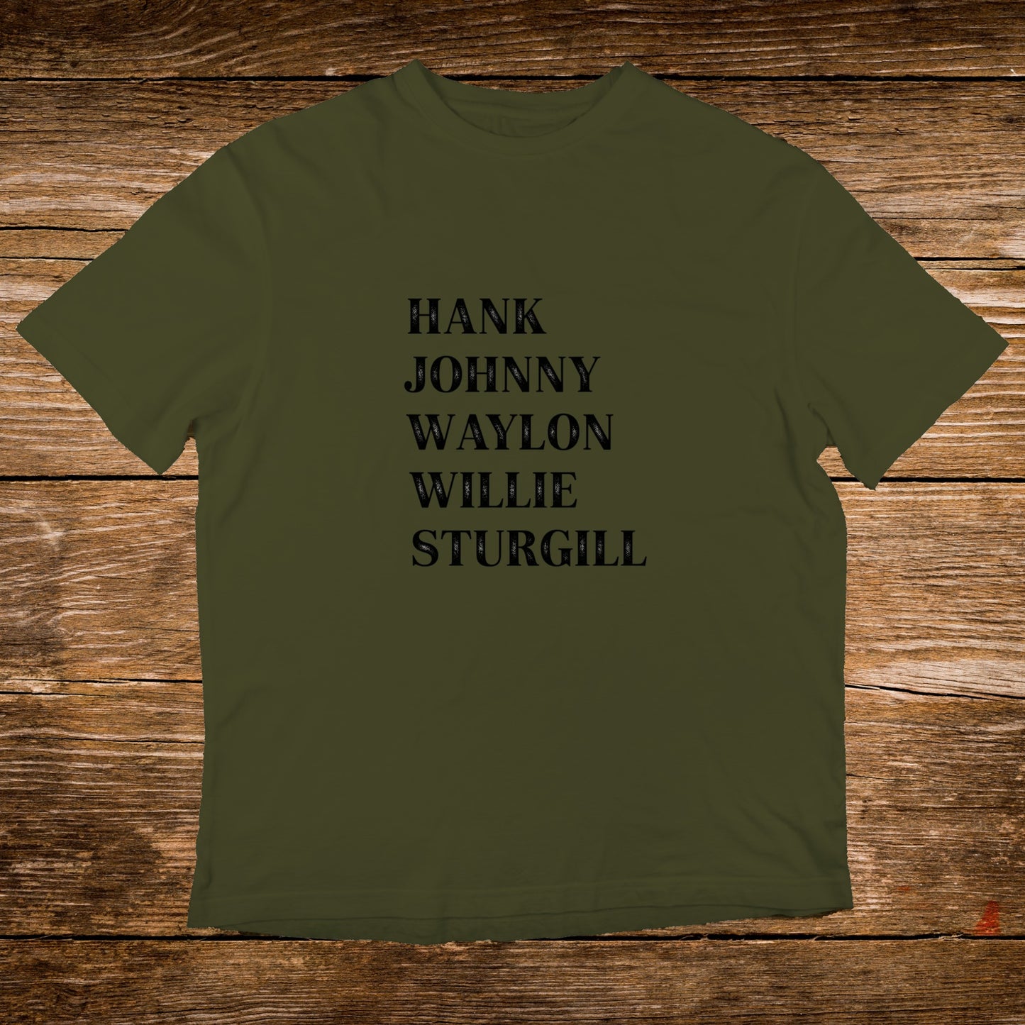 Olive green t-shirt with "Hank, Johnny, Waylon, Willie, Sturgill" printed in black text.