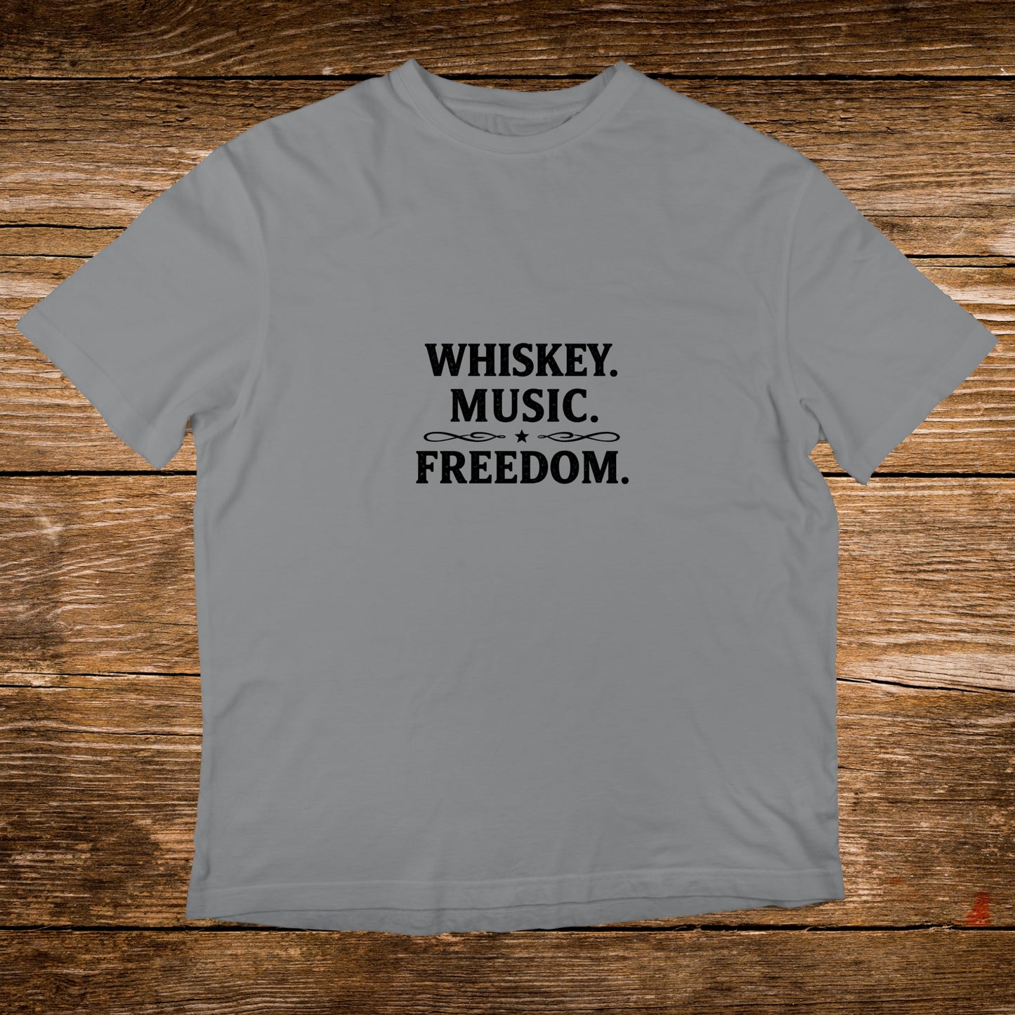 Grey t-shirt with "WHISKEY. MUSIC. FREEDOM." text.