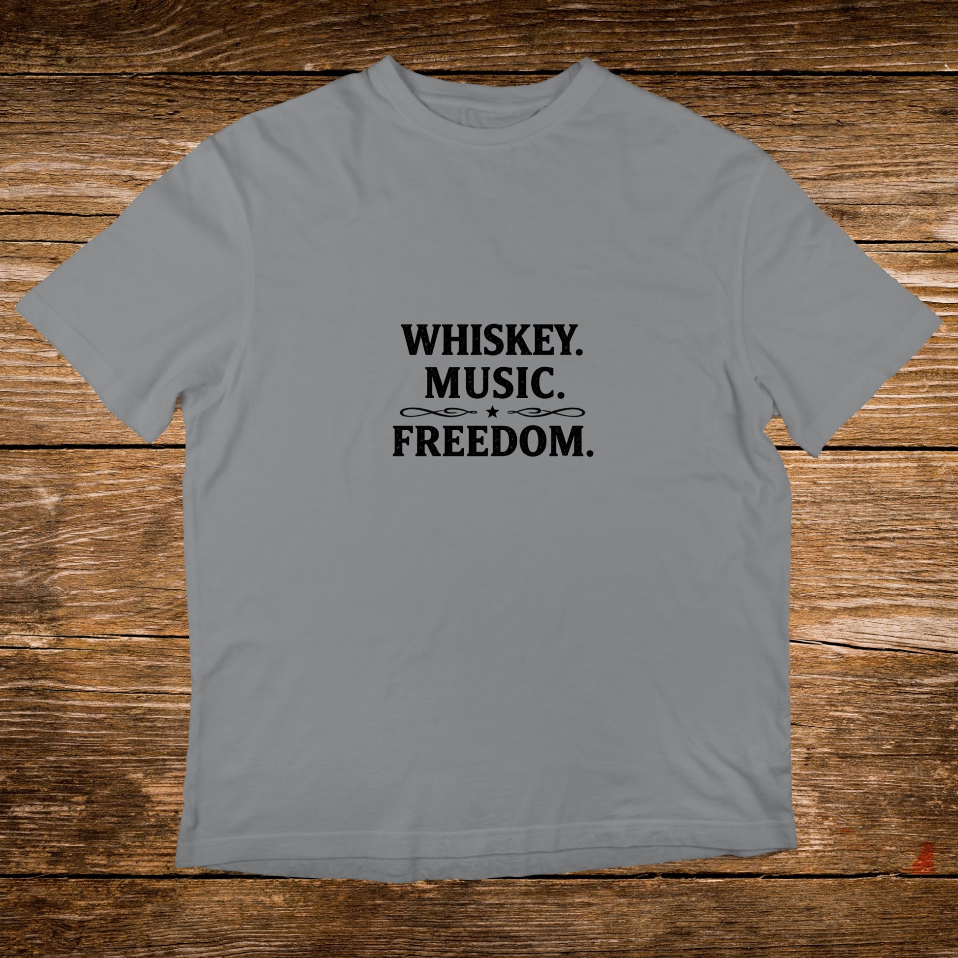 Grey t-shirt with "WHISKEY. MUSIC. FREEDOM." text.