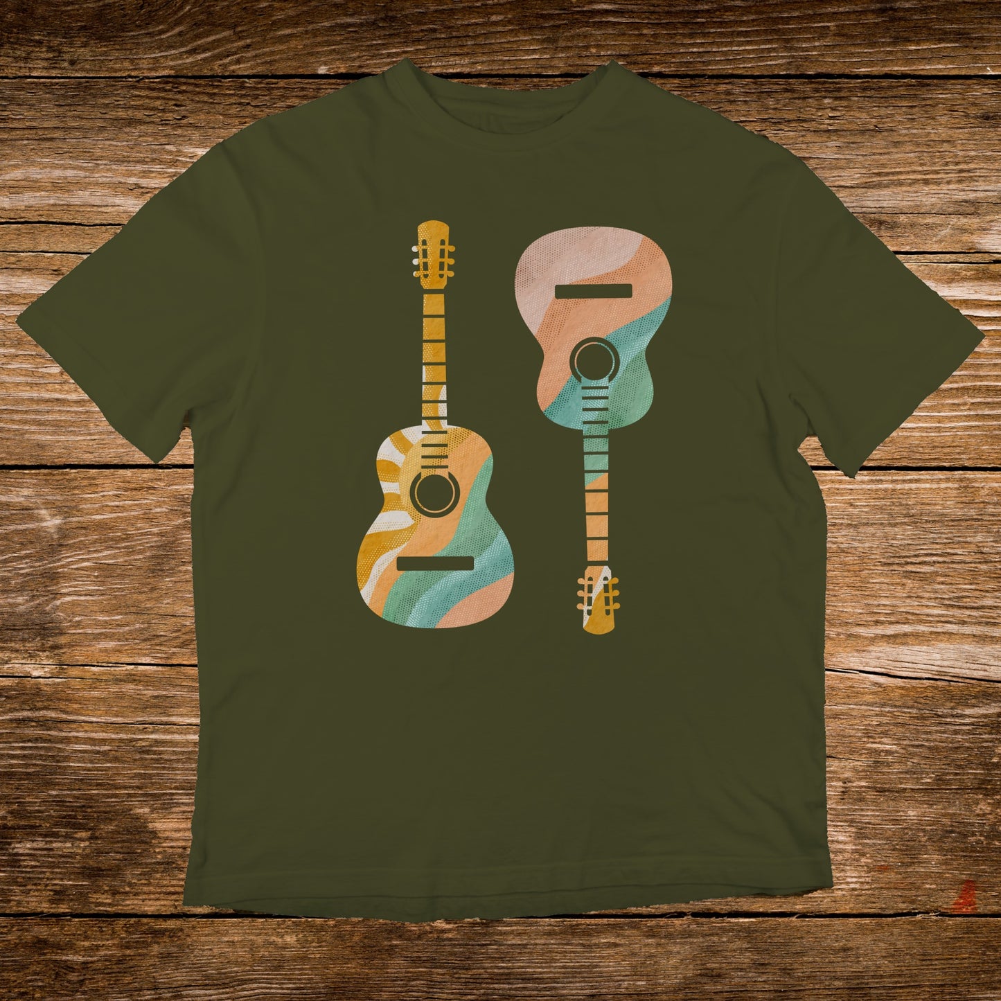 Two acoustic guitars with a colorful, wavy pattern on a green t-shirt.
