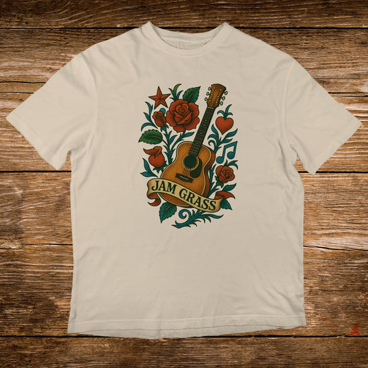 Cream t-shirt with JAM GRASS text, acoustic guitar, roses, and musical notes.