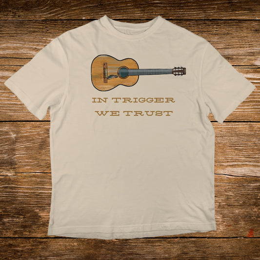 T-shirt with acoustic guitar graphic and text "IN TRIGGER WE TRUST".