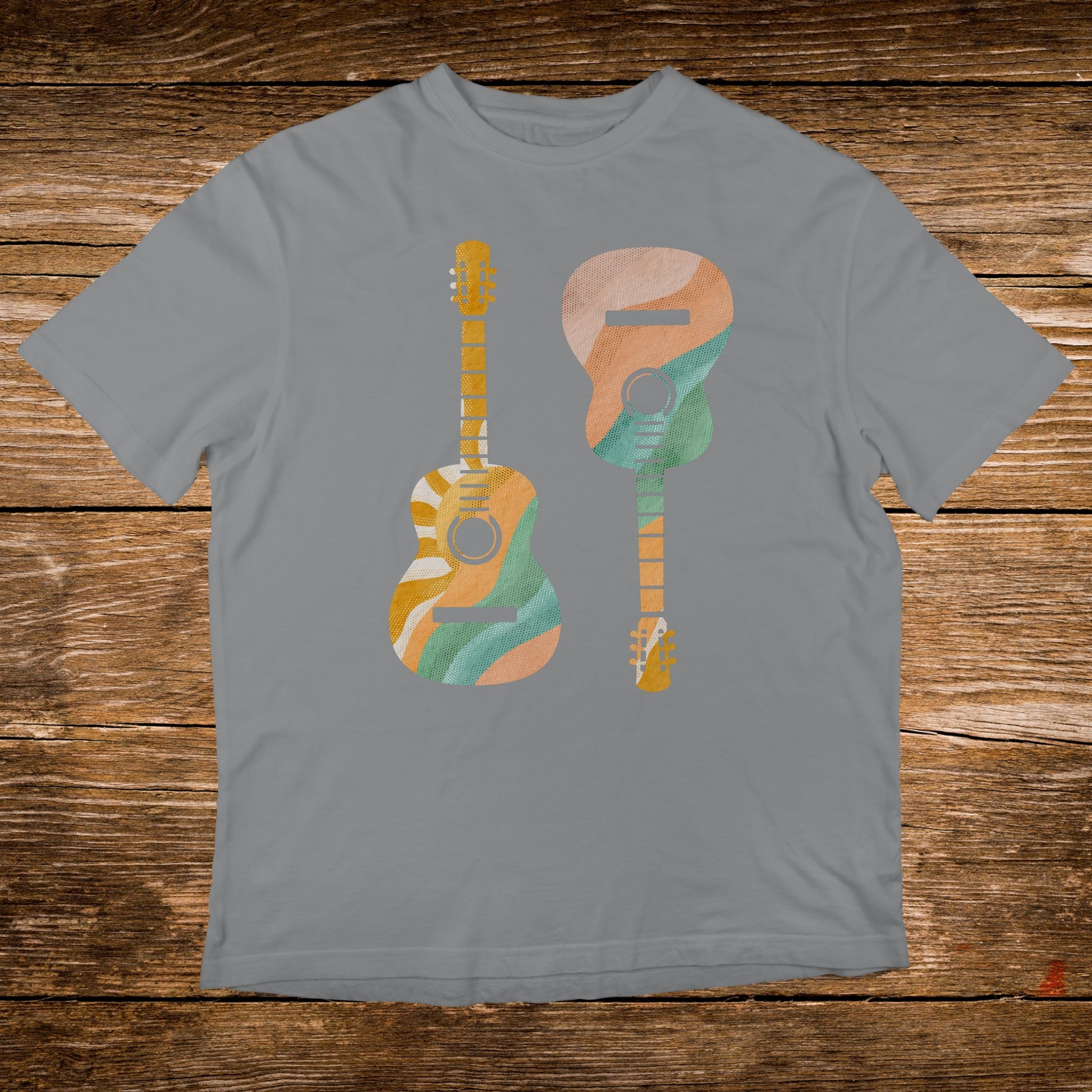 Two stylized guitars with wavy abstract patterns on a gray t-shirt.