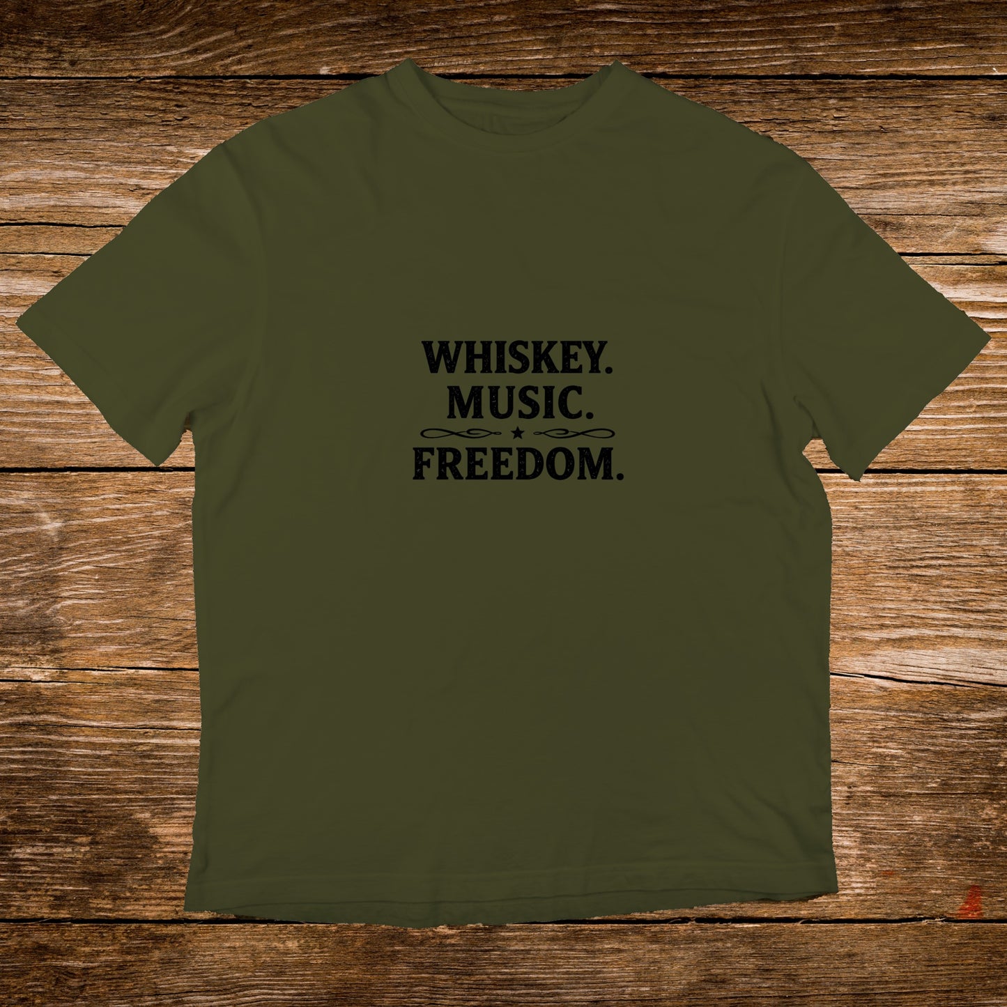 Olive green t-shirt with "Whiskey. Music. Freedom." text in black.