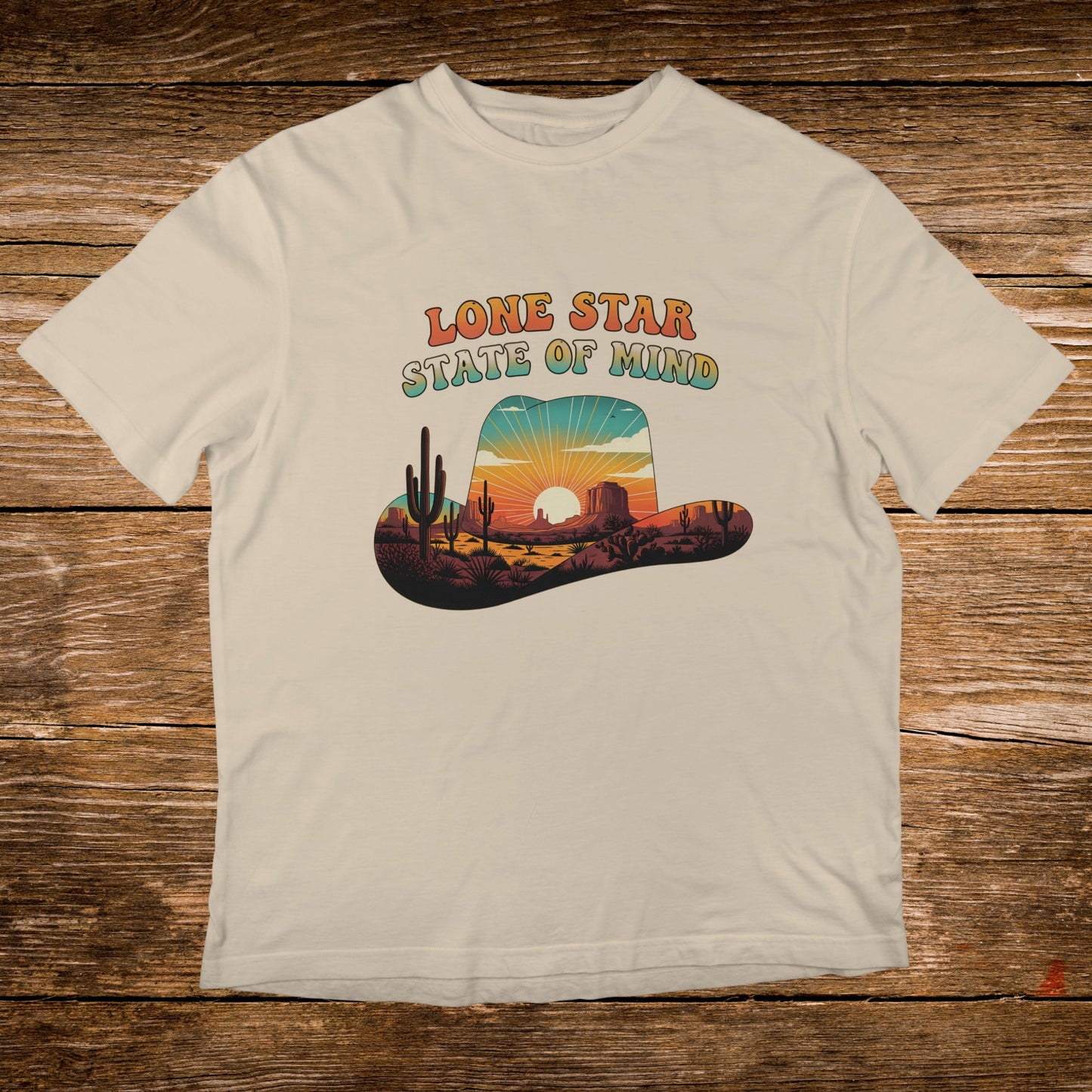 Western hat graphic with "Lone Star State of Mind" and desert landscape.