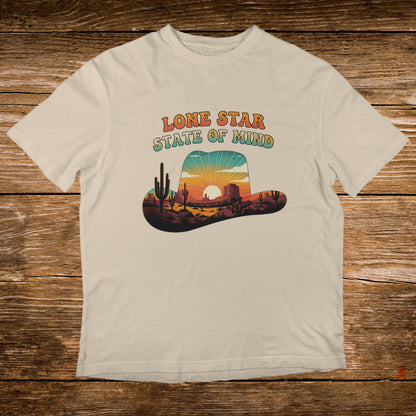 Western hat graphic with "Lone Star State of Mind" and desert landscape.
