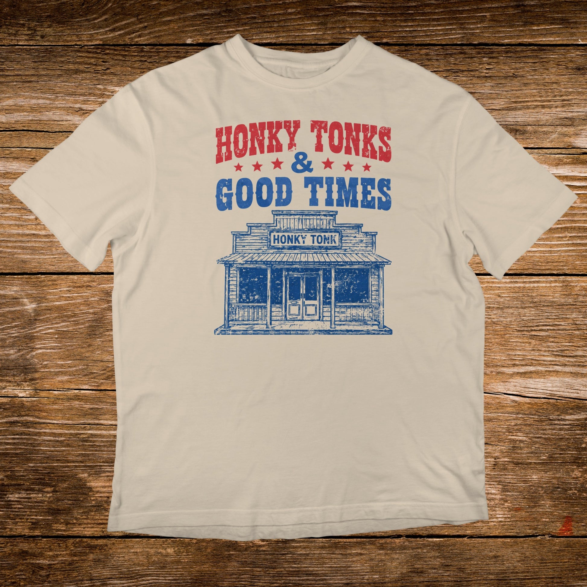 Cream t-shirt with distressed "Honky Tonks & Good Times" text and building graphic.