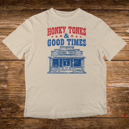 Cream t-shirt with distressed "Honky Tonks & Good Times" text and building graphic.