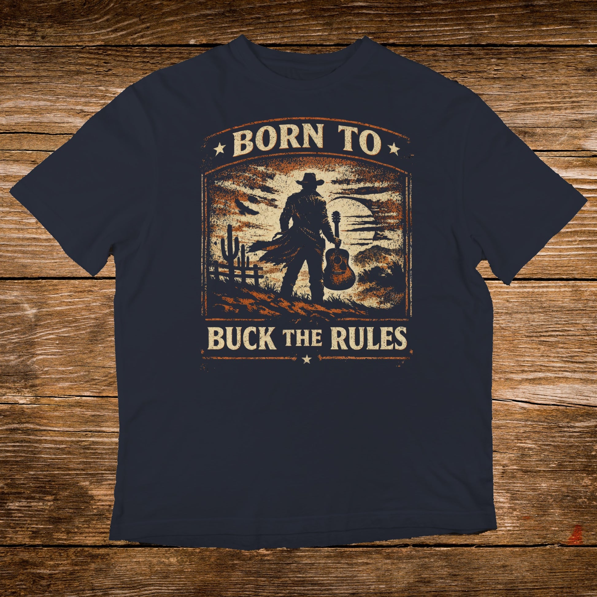Dark blue t-shirt with a distressed western graphic and "Born to Buck the Rules" text.