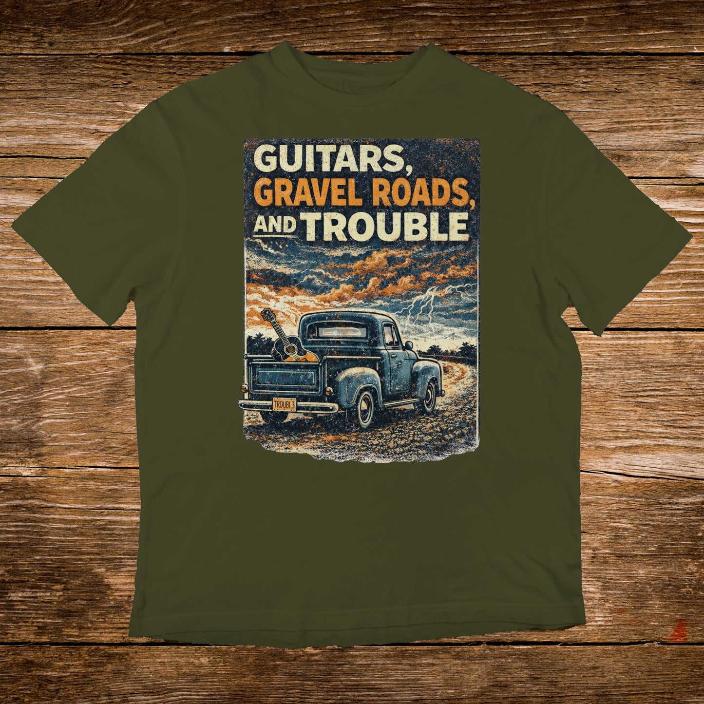 Blue pickup truck with guitars in bed, storm sky, "Guitars, Gravel Roads, and Trouble" text.
