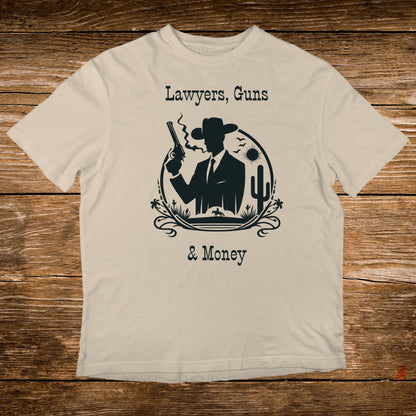T-shirt with silhouette of cowboy, gun, cactus, and text: Lawyers, Guns & Money.