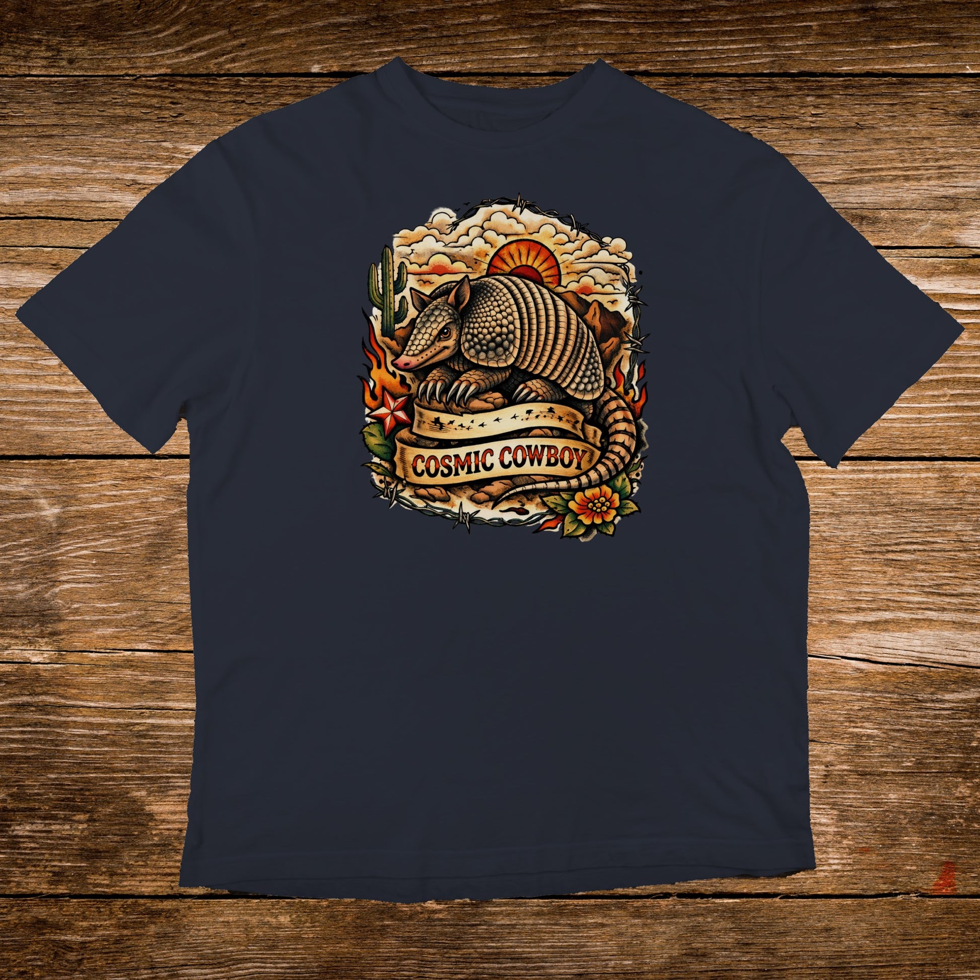 Armadillo and desert scene graphic with "Cosmic Cowboy" text on a dark t-shirt.