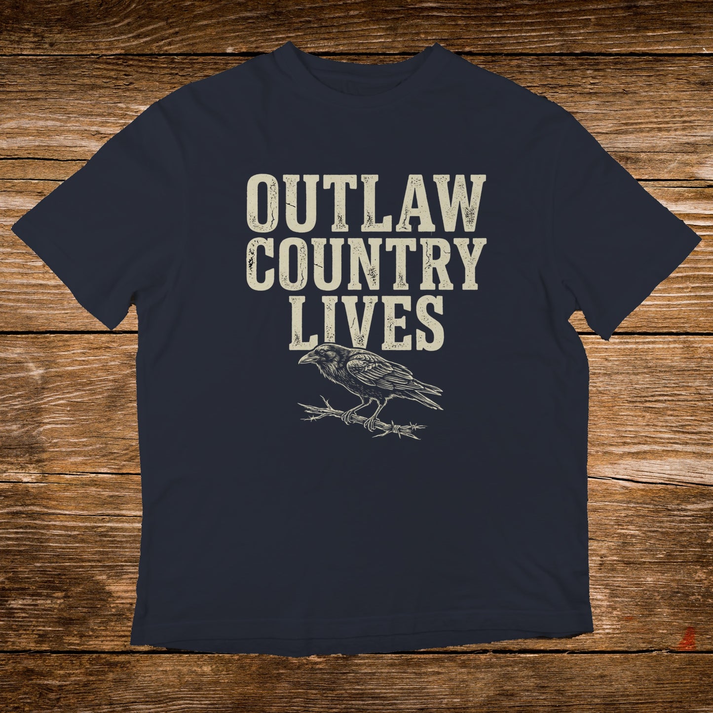 Dark blue t-shirt with "OUTLAW COUNTRY LIVES" text and a raven graphic.