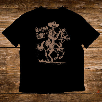 Black t-shirt featuring a skeleton cowboy riding a horse, text "Graveyard Rodeo".