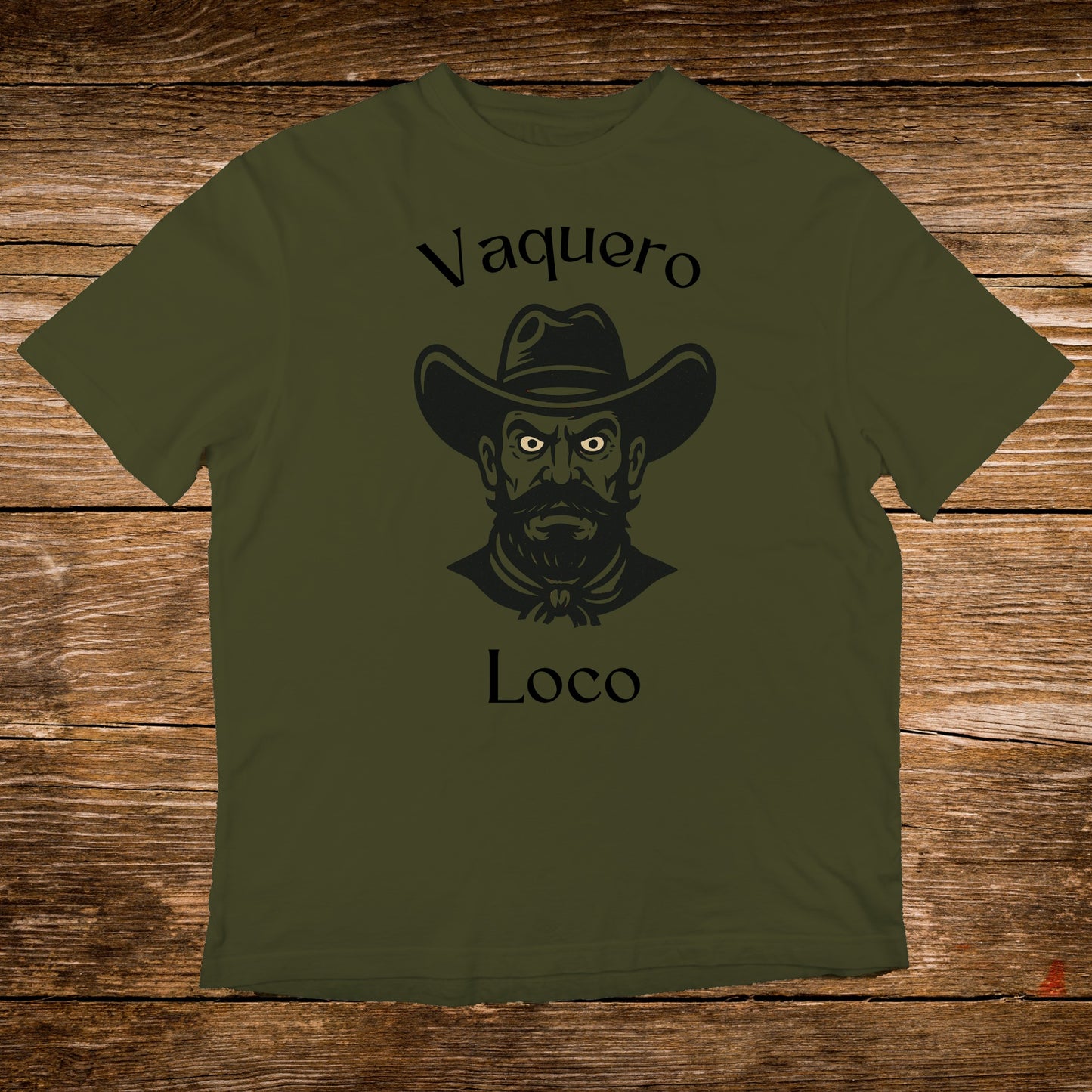 Olive green t-shirt with black Vaquero Loco cowboy head graphic.