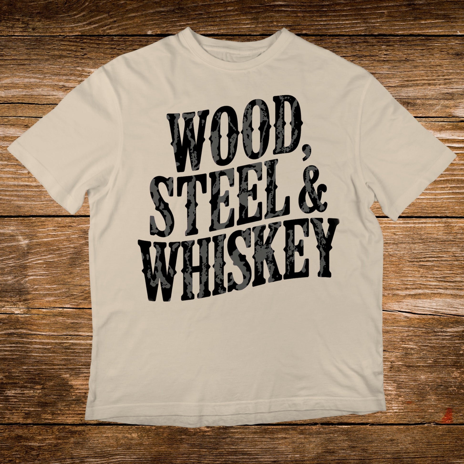 Cream t-shirt with "WOOD, STEEL & WHISKEY" in distressed black lettering.
