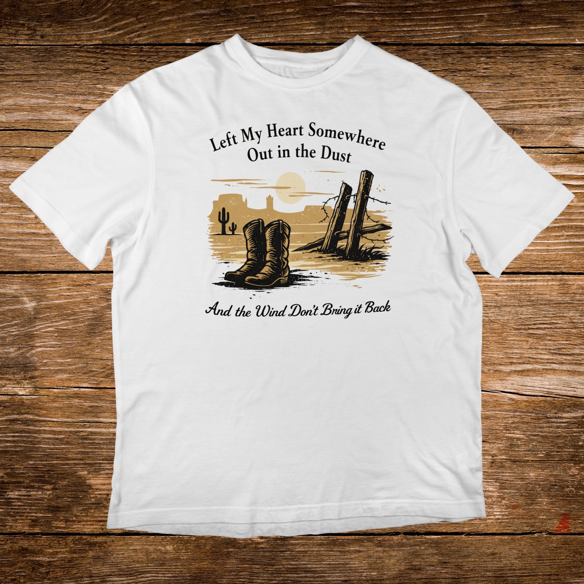 White t-shirt with western boots, desert scene, and text.
