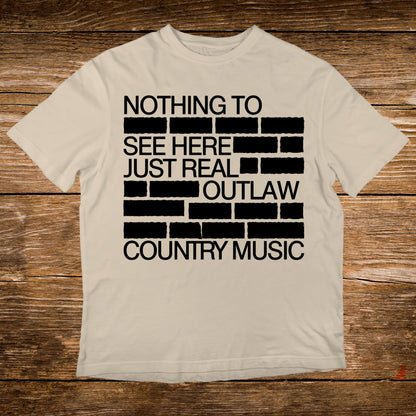 T-shirt with text "Nothing to see here. Just real outlaw country music."