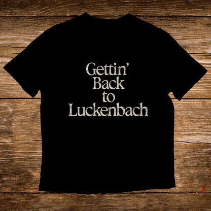 Black t-shirt with white text reading "Gettin' Back to Luckenbach".