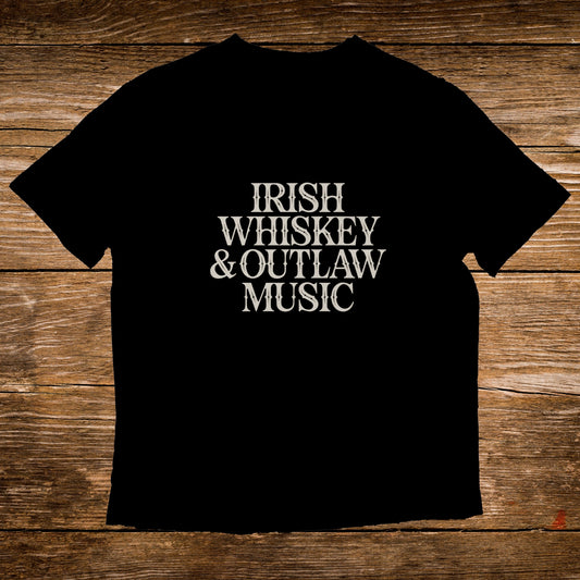 Black t-shirt with white text "IRISH WHISKEY & OUTLAW MUSIC".
