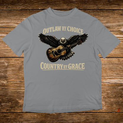 Gray t-shirt with eagle, guitar, and text "Outlaw by Choice, Country by Grace".