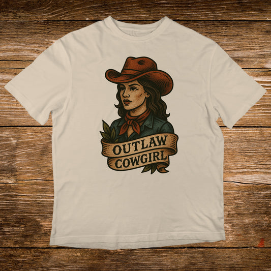 T-shirt with a vintage-style illustration of an outlaw cowgirl on a banner.