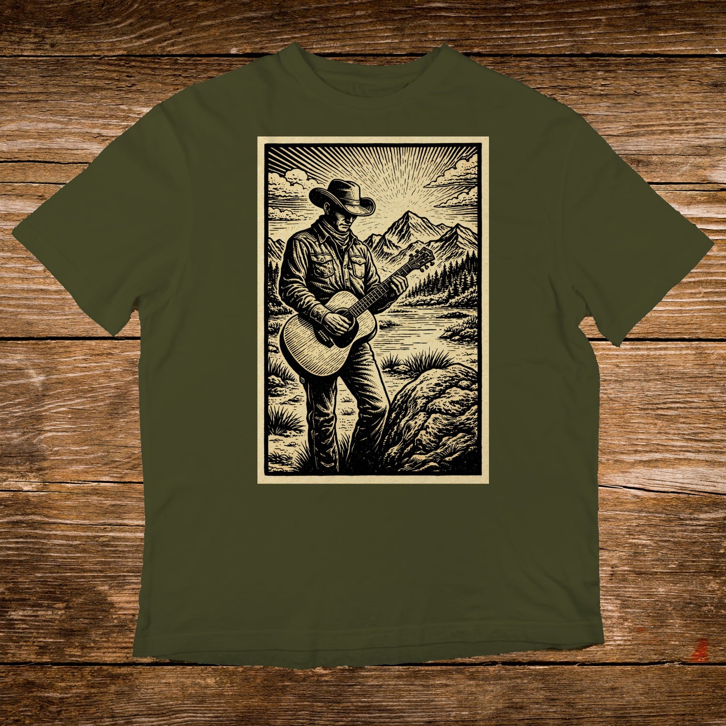 Man in cowboy hat playing guitar in scenic mountain landscape.