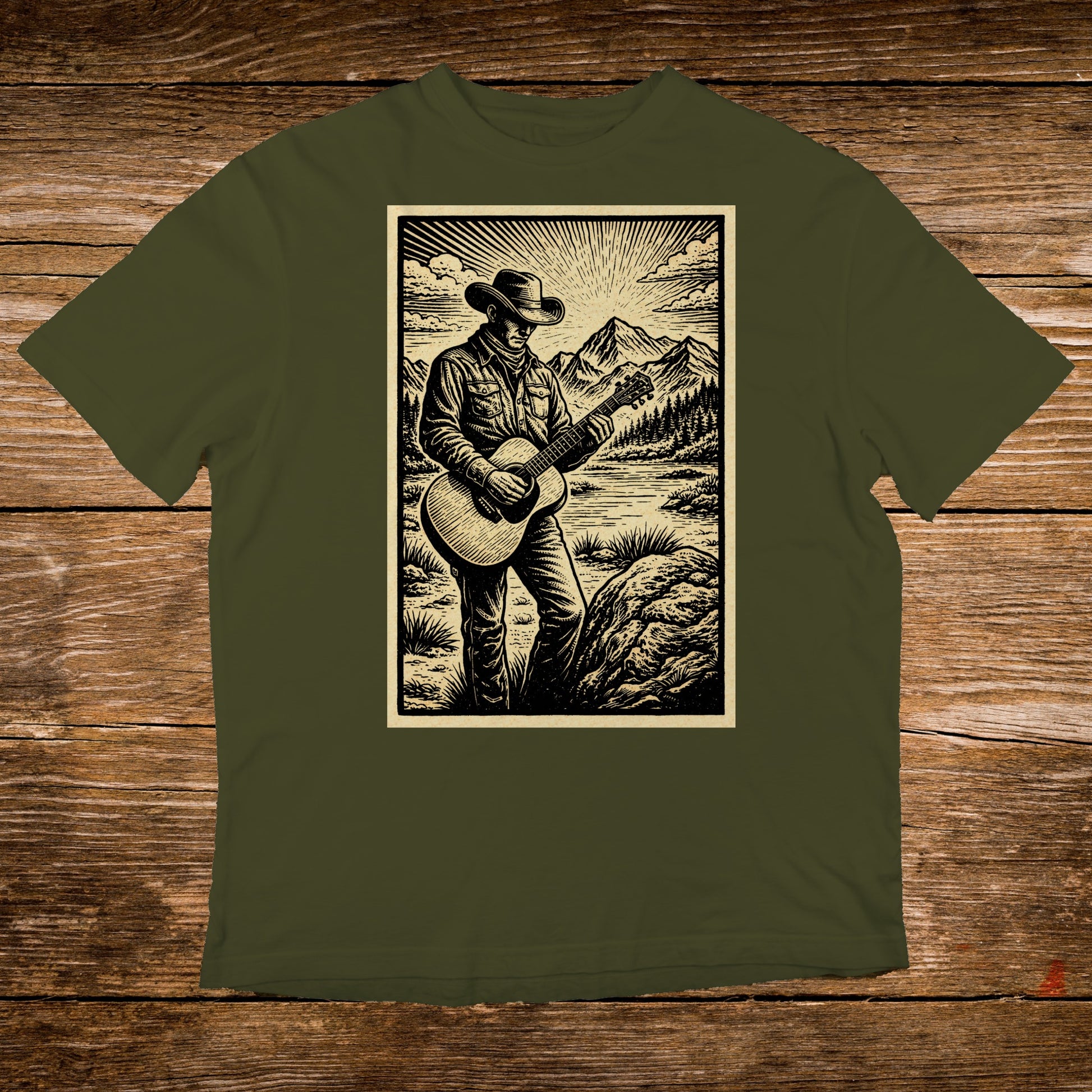 Man in cowboy hat playing guitar in scenic mountain landscape.